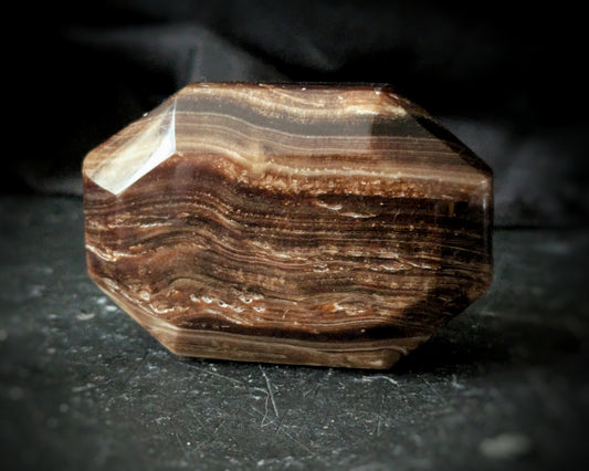 Chocolate Calcite  Faceted Palmstone 1